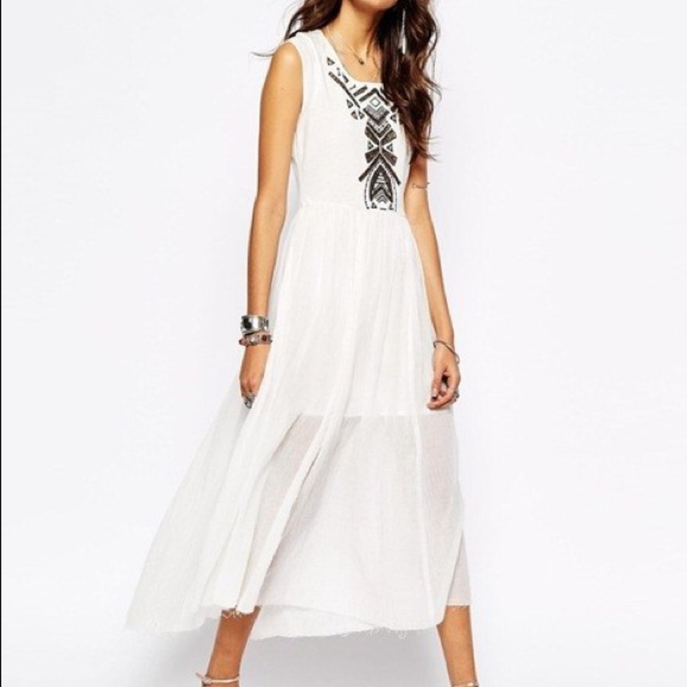 Toosaloosa Slub Meadows Midi Dress
FREE PEOPLE